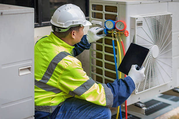 Professional Hvac technician working in Potomac, MD